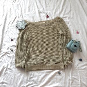 Of white shimmery sweater